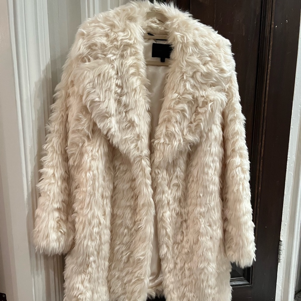 White faux fur coat by Kendall + Kylie